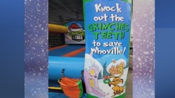 Slide1 1669409576 Knock the Grinches Teeth Inflatable